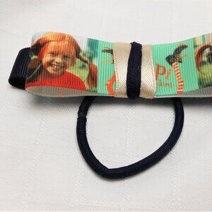 No 17-18: Two (2) bows on interchangeable rings for hairpins with Pippi designs